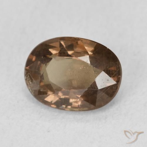 Granate que cambia de color Marrón oscuro natural de 1.16 ct, Ovalada, VS