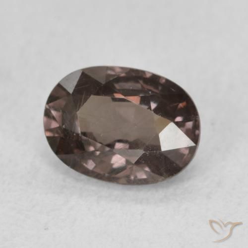 Granate que cambia de color Marrón oscuro natural de 1.06 ct, Ovalada, VS