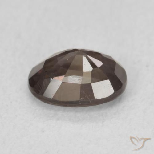 Granate que cambia de color Marrón oscuro natural de 1.06 ct, Ovalada, VS