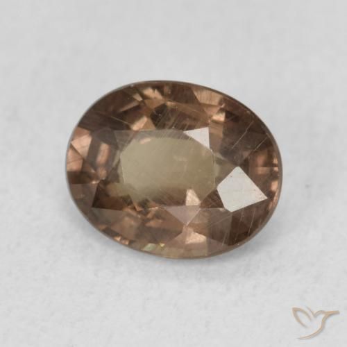 Granate que cambia de color Marrón oscuro natural de 1.01 ct, Ovalada, VS