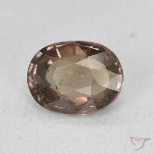 Granate que cambia de color Marrón oscuro natural de 0.94 ct, Ovalada, VS