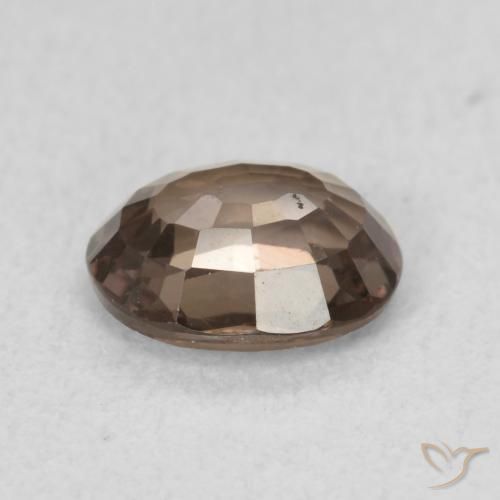 Granate que cambia de color Marrón oscuro natural de 0.94 ct, Ovalada, VS
