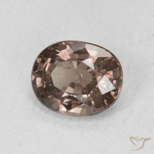 Granate que cambia de color Marrón oscuro natural de 0.97 ct, Ovalada, VS