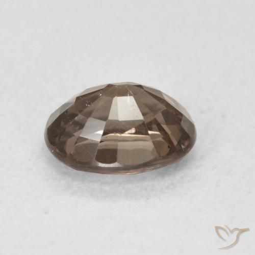 Granate que cambia de color Marrón oscuro natural de 0.97 ct, Ovalada, VS