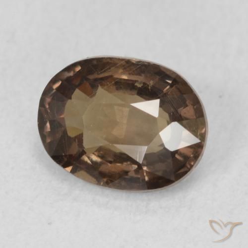 Granate que cambia de color Marrón oscuro natural de 1.26 ct, Ovalada, VS