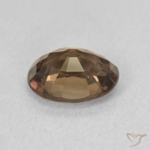 Granate que cambia de color Marrón claro medio natural de 1.37 ct, Ovalada, VS