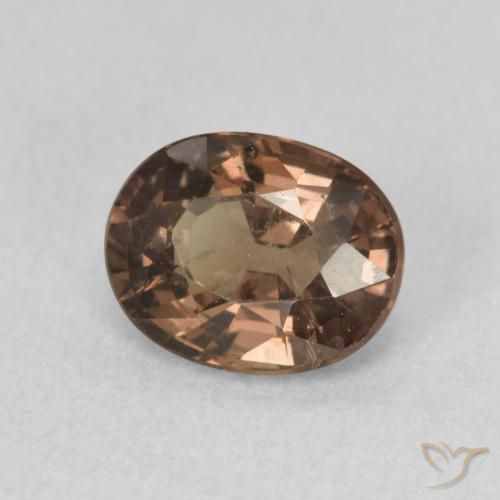 Granate que cambia de color Marrón claro medio natural de 1.39 ct, Ovalada, VS