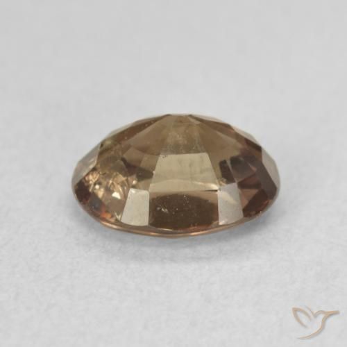 Granate que cambia de color Marrón claro medio natural de 1.39 ct, Ovalada, VS