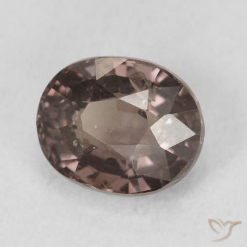 Granate que cambia de color Marrón claro medio natural de 1.17 ct, Ovalada, VS