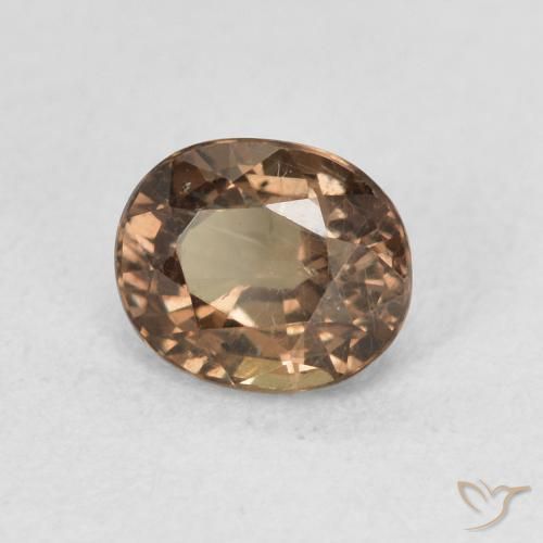 Granate que cambia de color Marrón oscuro natural de 0.94 ct, Ovalada, VS
