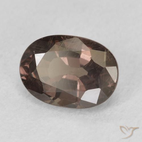 Granate que cambia de color Marrón oscuro natural de 1.34 ct, Ovalada, VS