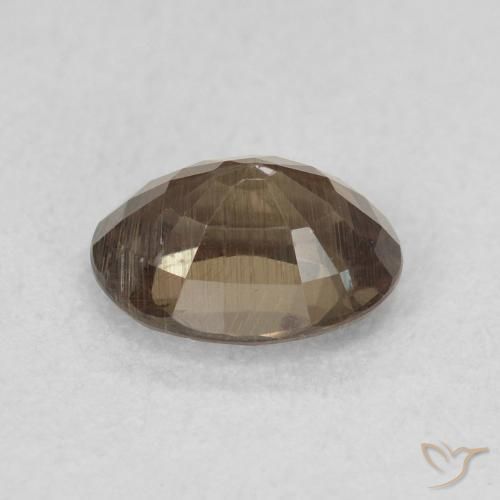 Granate que cambia de color Marrón oscuro natural de 0.97 ct, Ovalada, VS