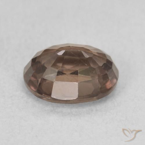 Granate que cambia de color Marrón oscuro natural de 1.28 ct, Ovalada, VS