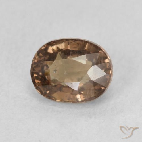 Granate que cambia de color Marrón oscuro natural de 0.99 ct, Ovalada, VS