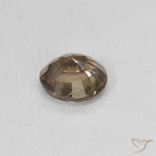 Granate que cambia de color Marrón cálido natural de 0.79 ct, Redondo, VS