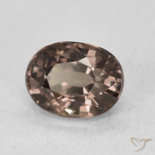 Granate que cambia de color Marrón oscuro natural de 0.98 ct, Ovalada, VVS
