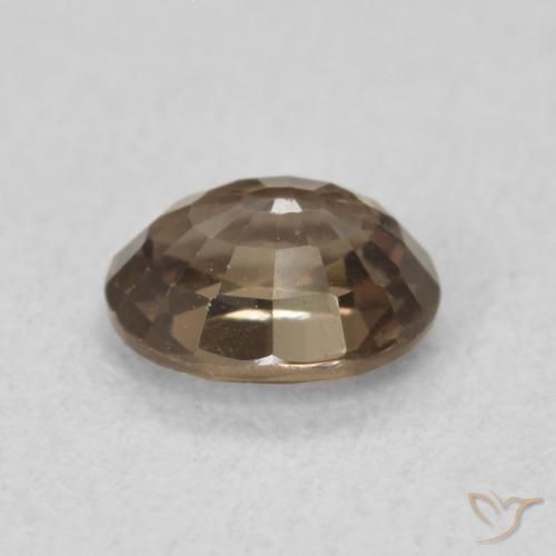 Granate que cambia de color Marrón oscuro natural de 0.80 ct, Ovalada, VVS