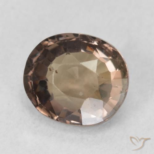 Granate que cambia de color Marrón oscuro natural de 1.16 ct, Ovalada, VVS