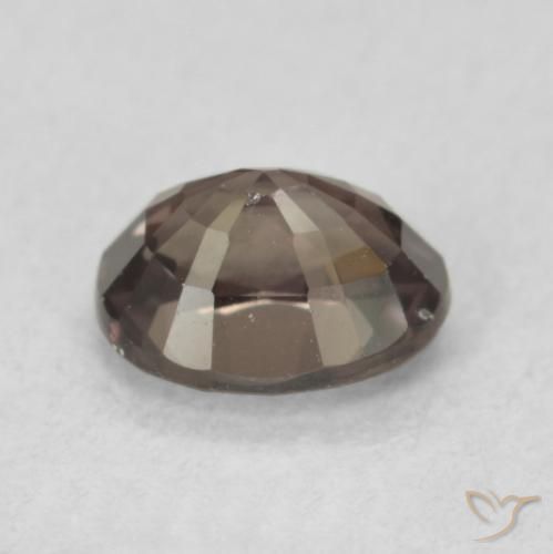Granate que cambia de color Marrón nuez natural de 0.92 ct, Ovalada, VVS
