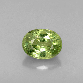 Granate demantoide verde natural de 0,79 ct, corte óvalo, VS-SI