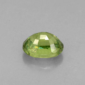 Granate demantoide verde natural de 0,79 ct, corte óvalo, VS-SI