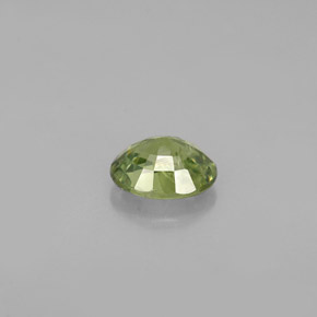 Granate demantoide verde natural de 0,66 ct, corte óvalo, VS-SI