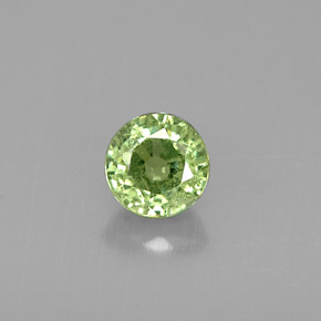Granate demantoide verde natural de 0,60 ct, corte redondo, VS