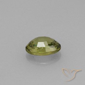 Granate demantoide verde natural de 0,61 ct, corte óvalo, VVS-VS