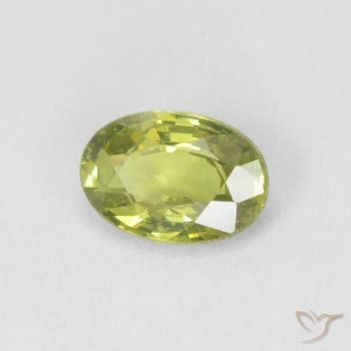 Granate demantoide Verde terroso cálido natural de 0.55 ct, Ovalada, VVS-VS