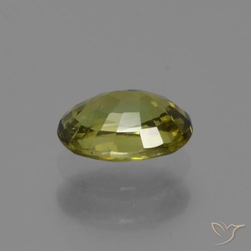 Granate demantoide Verde medio natural de 0.61 ct, Ovalada, VS