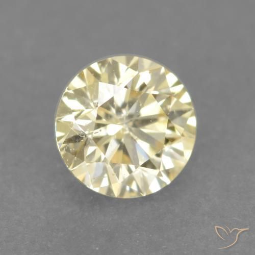Diamante Amarillo claro natural de 0.18 ct, Redondo, VS
