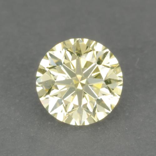 Diamante Amarillo claro medio natural de 0.18 ct, Corte Redondo, VVS-VS