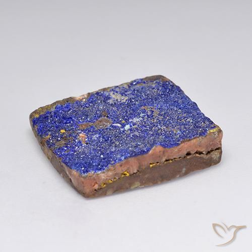 Drusa de azurita azul grisáceo natural de 15,81 ct, corte baguette, opaco