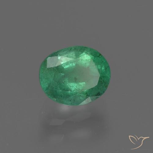 Esmeralda Verde cálido natural de 0.96 ct, Ovalada, SI