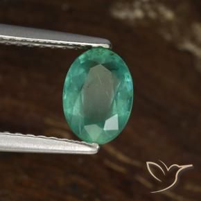 Esmeralda Verde frío natural de 0.92 ct, Corte Óvalo, SI