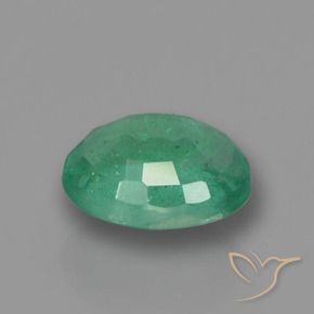 Esmeralda Verde frío natural de 0.88 ct, Ovalada, SI-I1