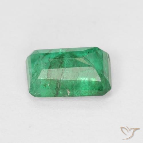 Esmeralda Verde cálido natural de 0.64 ct, Corte Octágono / Esmeralda, SI
