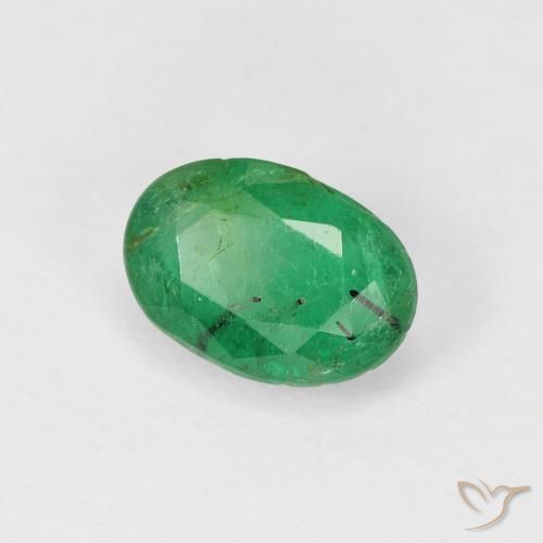 Esmeralda Verde cálido natural de 0.93 ct, Ovalada, SI