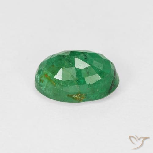 Esmeralda Verde cálido natural de 0.93 ct, Ovalada, SI