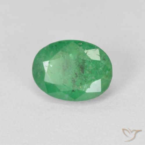 Esmeralda Verde amarillento natural de 0.80 ct, Ovalada, SI