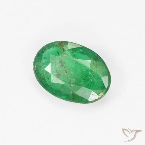 Esmeralda Verde amarillento natural de 0.62 ct, Ovalada, SI