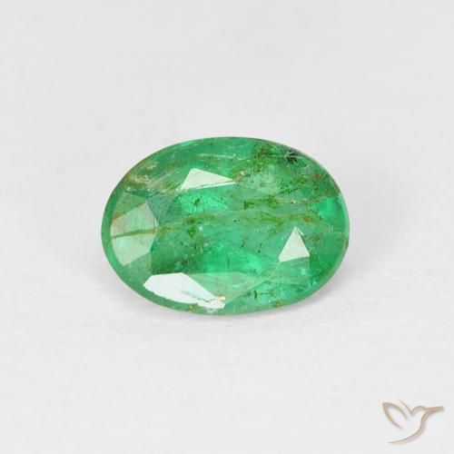 0.69ct Natural Verde amarillento Esmeralda, Ovalada, SI, Photo A