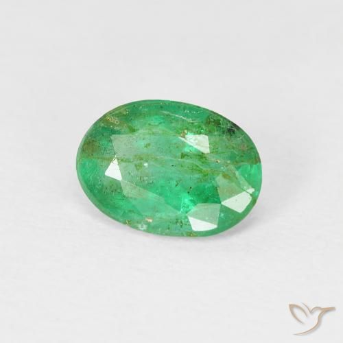 Esmeralda Verde amarillento natural de 0.69 ct, Ovalada, SI