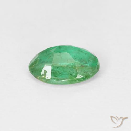 Esmeralda Verde amarillento natural de 0.69 ct, Ovalada, SI