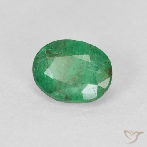 Esmeralda Verde claro medio natural de 0.60 ct, Ovalada, SI