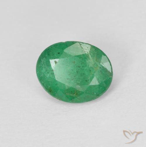Esmeralda Verde cálido natural de 0.60 ct, Ovalada, SI