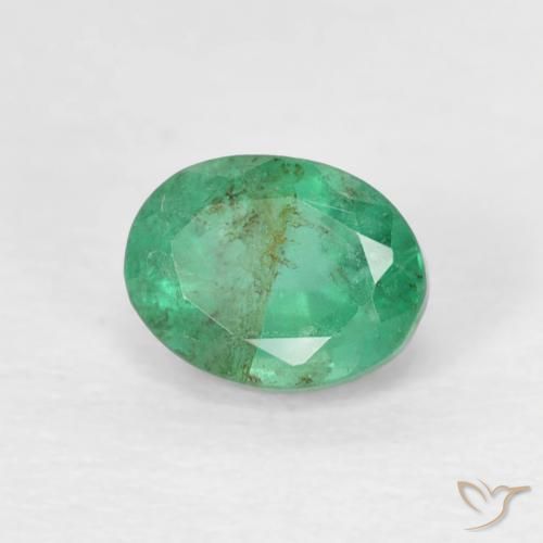 Esmeralda Verde frío natural de 0.47 ct, Ovalada, SI