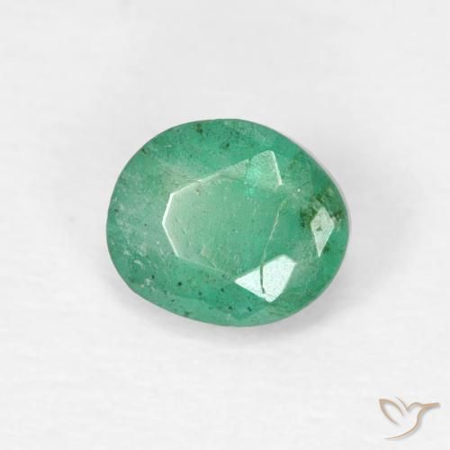 Esmeralda Verde frío natural de 0.38 ct, Ovalada, SI