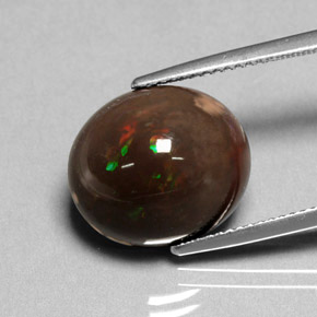 Ópalo de fuego multicolor natural de 7,95 ct, corte óvalo, opaco