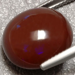 Ópalo de fuego multicolor natural de 10,31 ct, corte óvalo, opaco